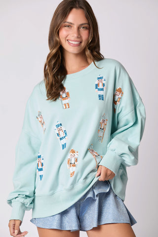 Sequins and Nutcrackers Sweatshirt in Baby Blue