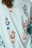 Sequins and Nutcrackers Sweatshirt in Baby Blue